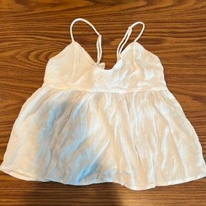 Brandy melville tank, scoop neck and flows out